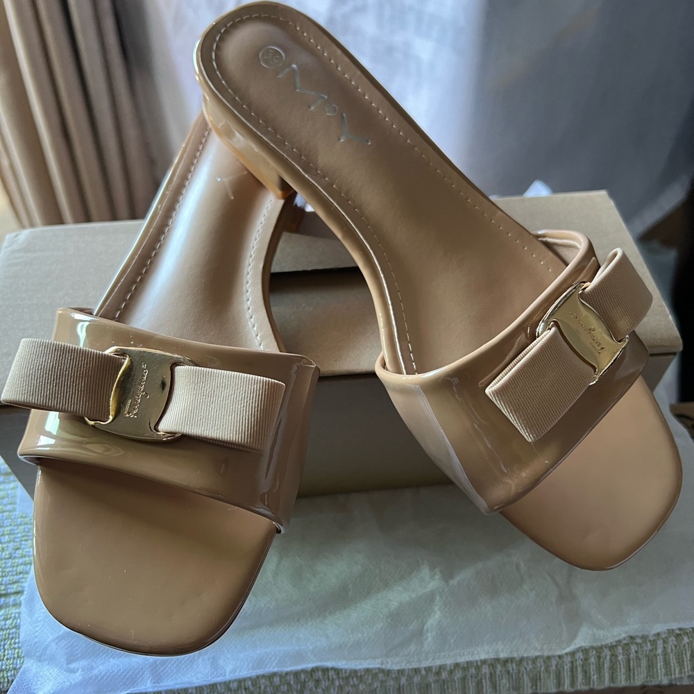 Beige Patent leather sandals. Brand new. Very pretty.  Size 8.5 or 39.